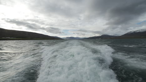 Foam-behind-a-boat-in-Iceland.-Cloudy-day